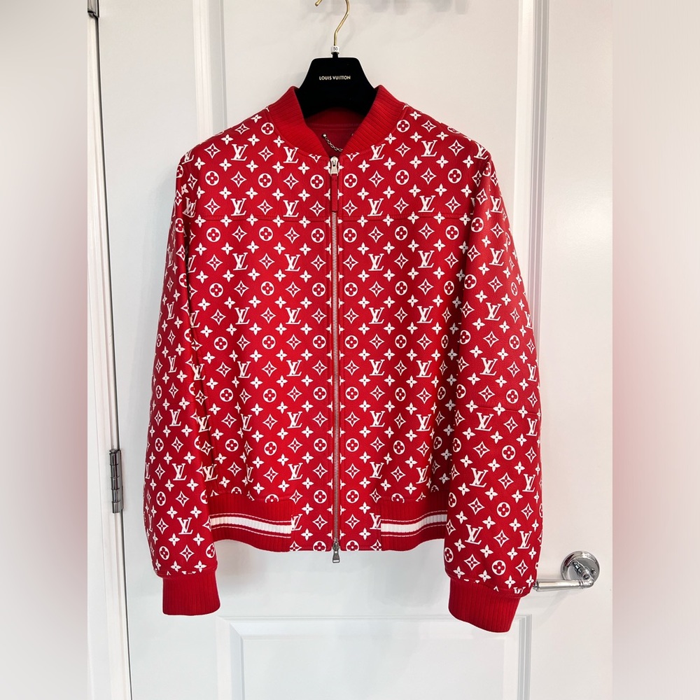 The Louis Vuitton x Supreme red bomber leather jacket, size 54, Fall 2017 runway